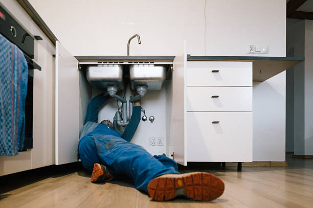 Professional Drain Cleaning technician working in Beltsville, MD